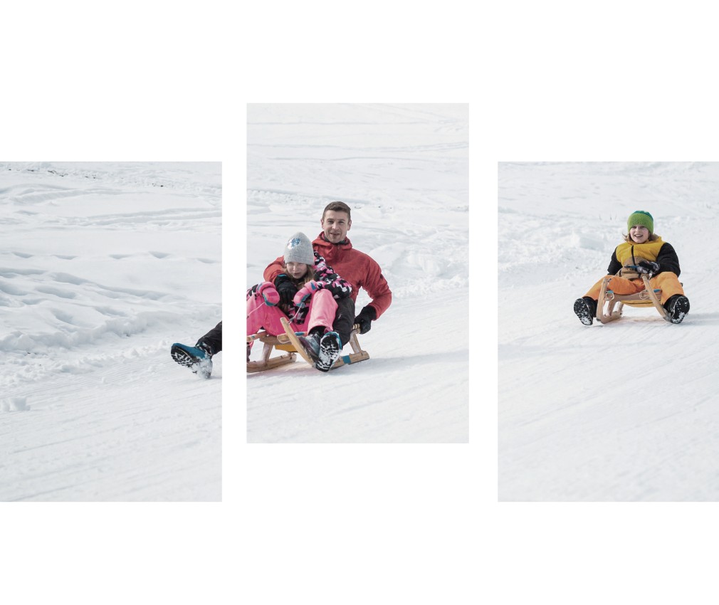 miramor: Winter fun on the slopes in Ratschings for the whole family Father with his two children downhill with the toboggan in Ratschings